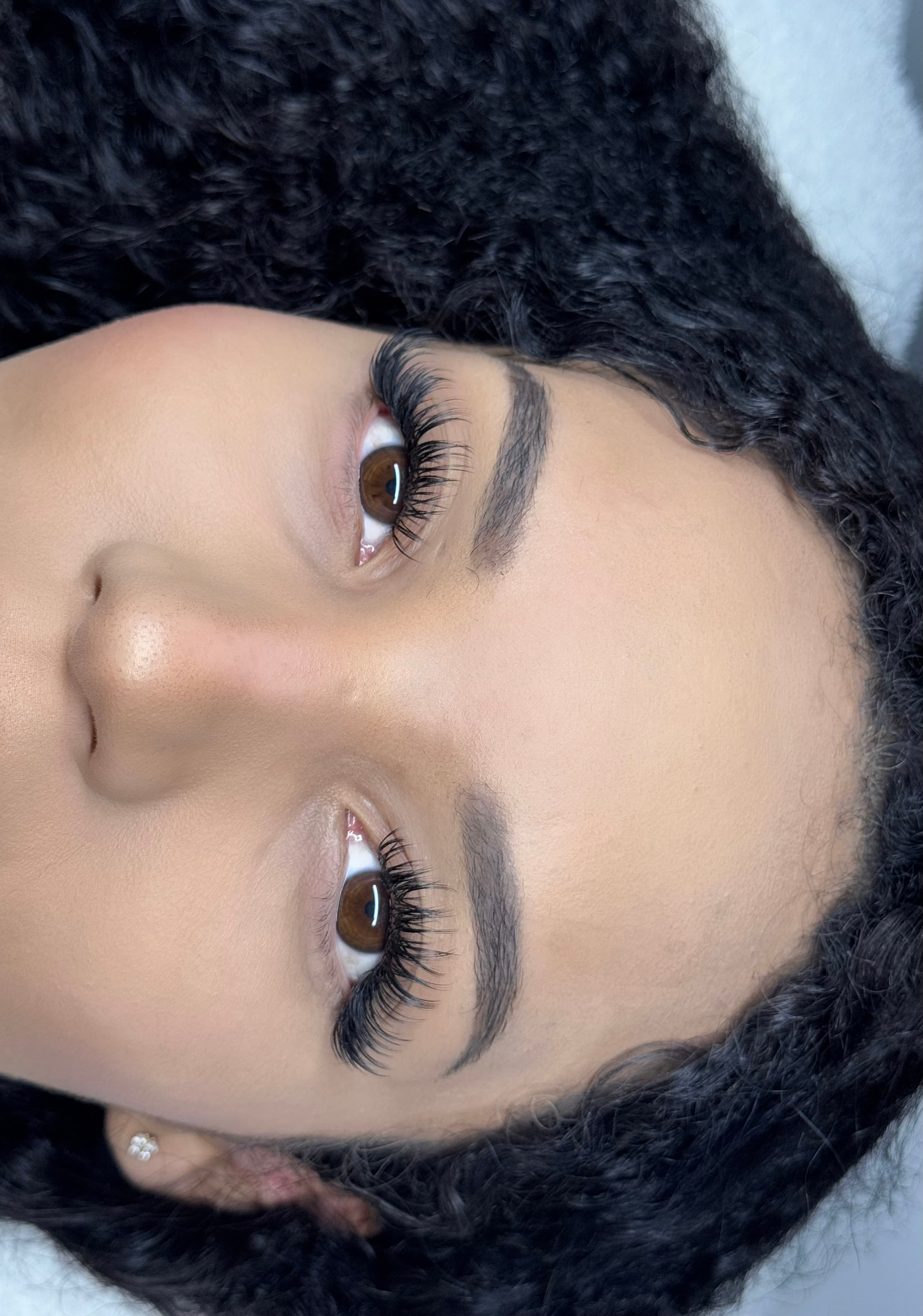 Wispy wet set lash extensions close-up by Extended By Mayah, Calgary SW